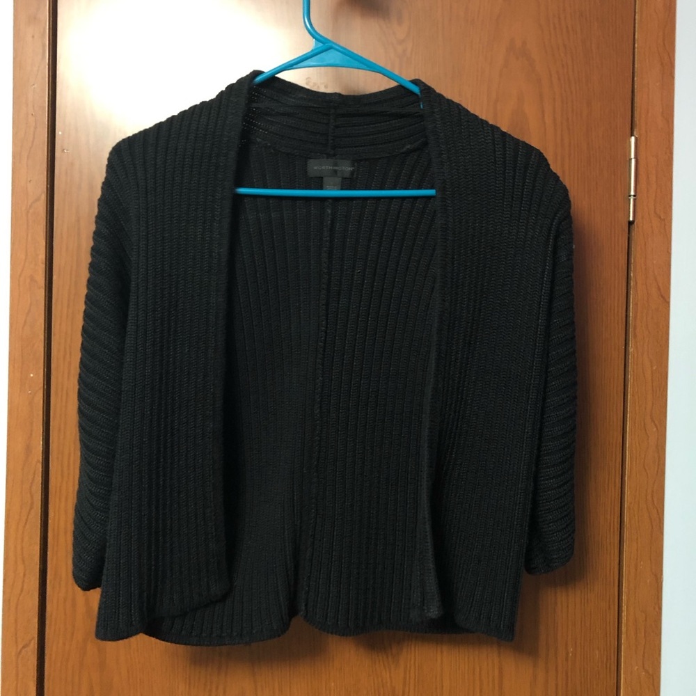 Crop sweater with 3/4 length sleeves.